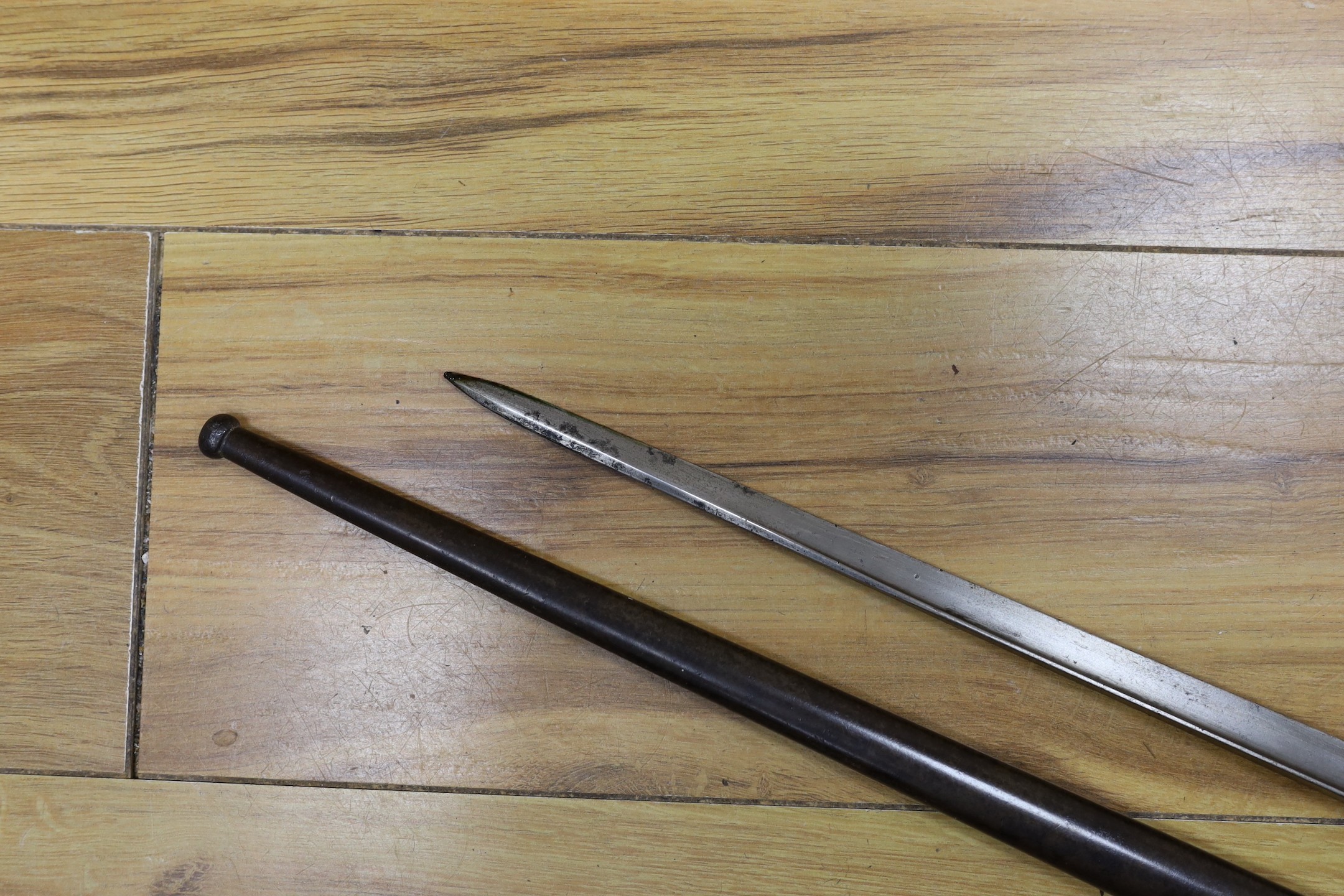 A Victorian officer's sword, lacking sheath, together with a 19th century French ’1877’ bayonet and sheath